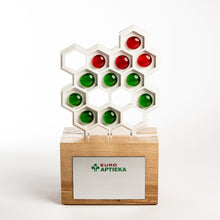 Load image into Gallery viewer, 3D cut custom award produced from oak wood and Meganite solid surface supplemented with glass nuggets