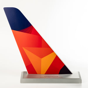 Distinctive airplane tail shape trophy with colourful digital print.