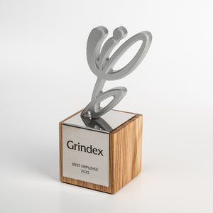 personalised awards from oak, metal and stone mass. Custom design.